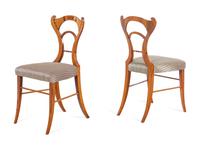 A Set of Four Biedermeier Inlaid Dining Chairs