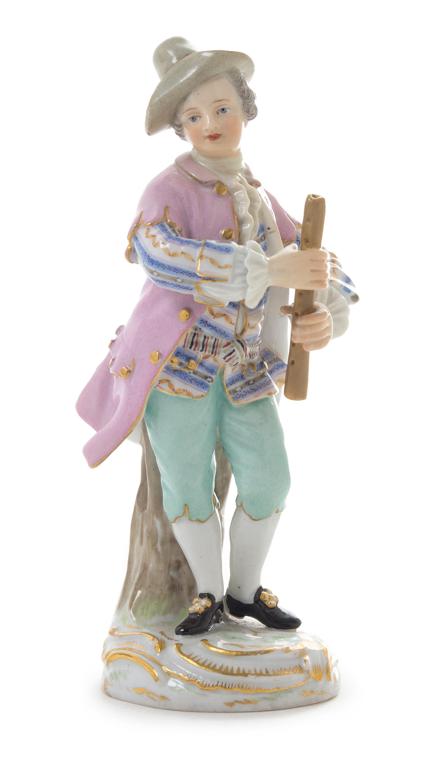 A Meissen Porcelain Figure Height 5 1/2 inches.