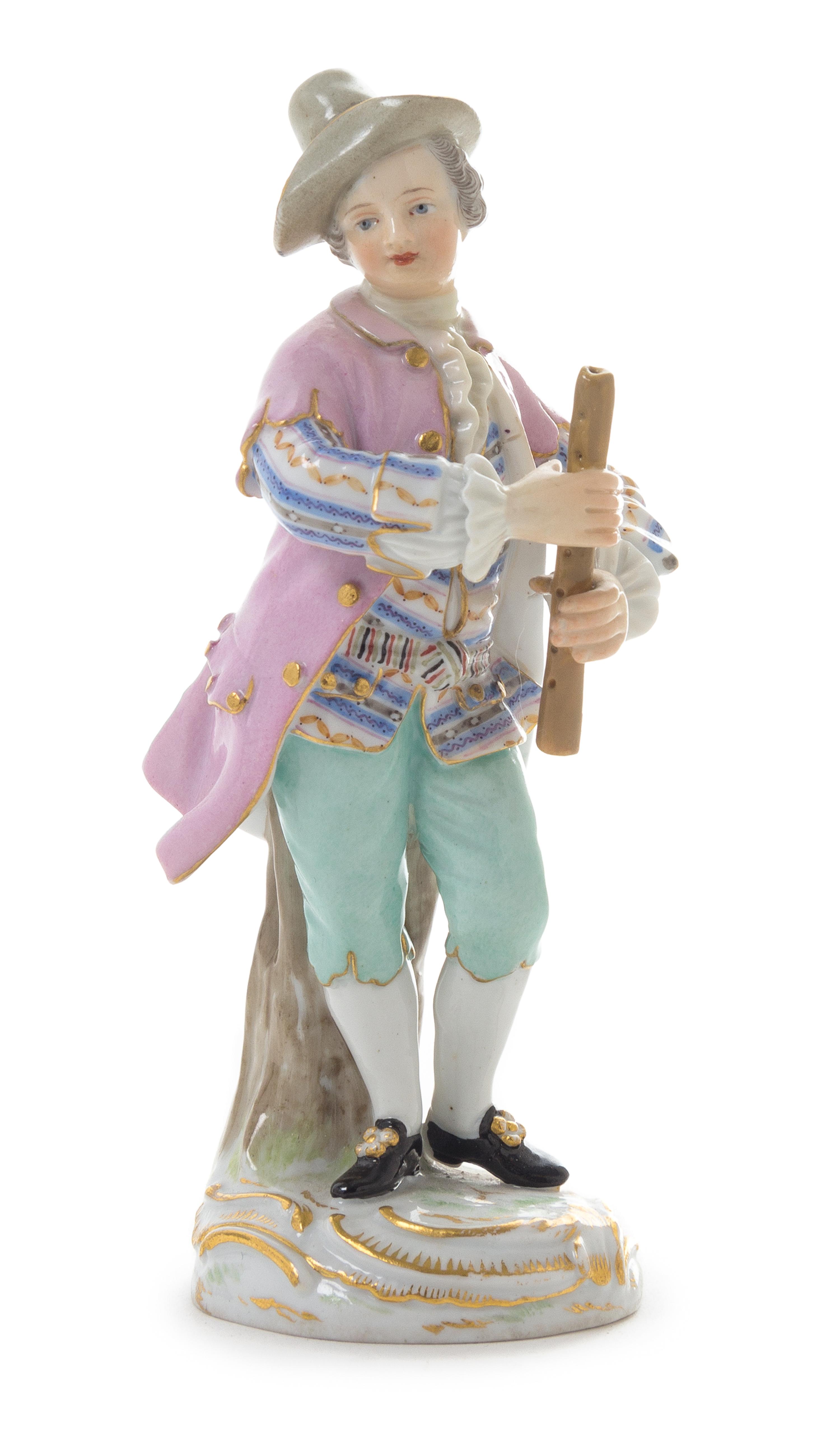 A Meissen Porcelain Figure Height 5 1/2 inches.