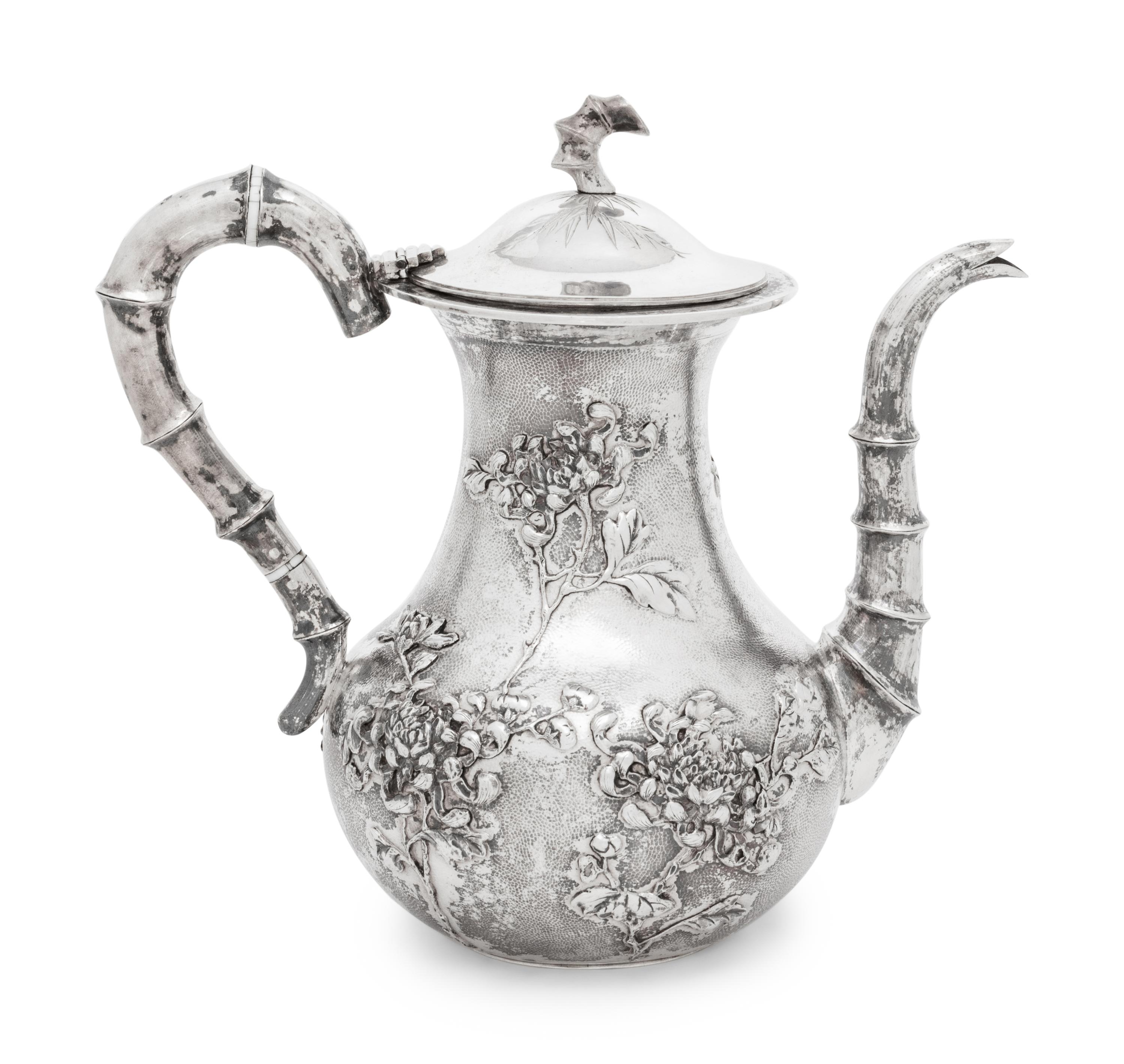 A Chinese Export Eight-Piece Silver Tea and Coffee Service