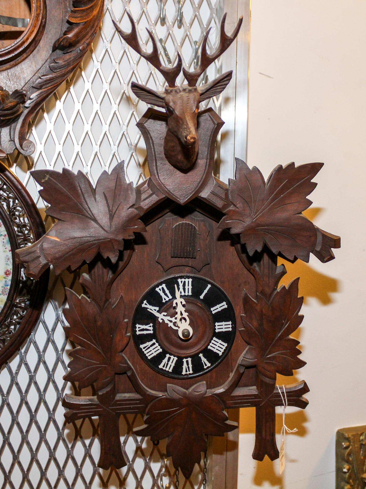 A German Black Forest Style Cuckoo Clock Height 16 inches. — LIKELY HUBERT HERR