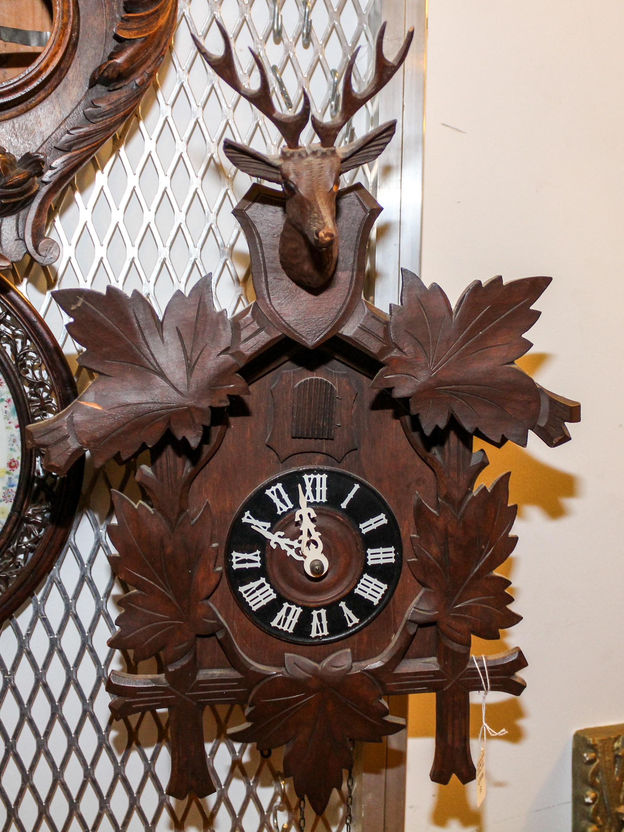A German Black Forest Style Cuckoo Clock Height 16 inches. — LIKELY HUBERT HERR