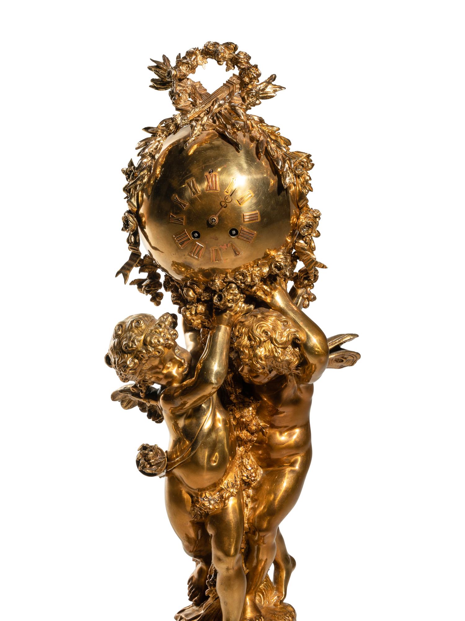 A French Gilt Bronze and Marble Figural Clock