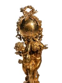A French Gilt Bronze and Marble Figural Clock