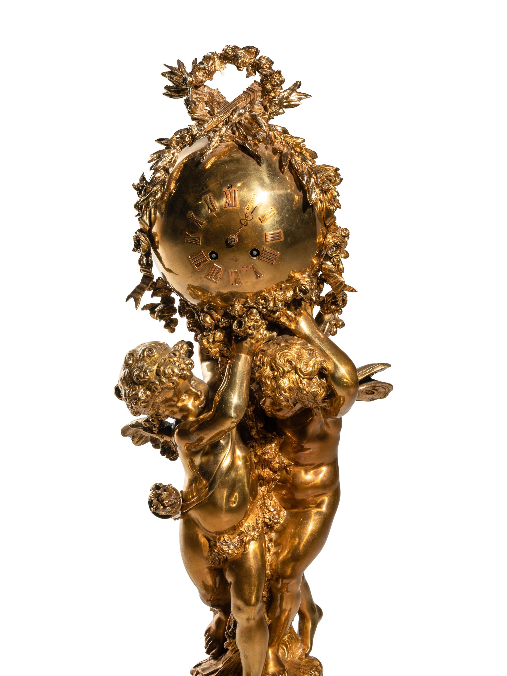 A French Gilt Bronze and Marble Figural Clock