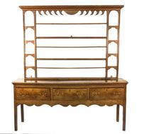 An English Oak Welsh Dresser Height 82 3/4 x width 74 3/4 x depth 18 3/4 inches. — 19TH CENTURY