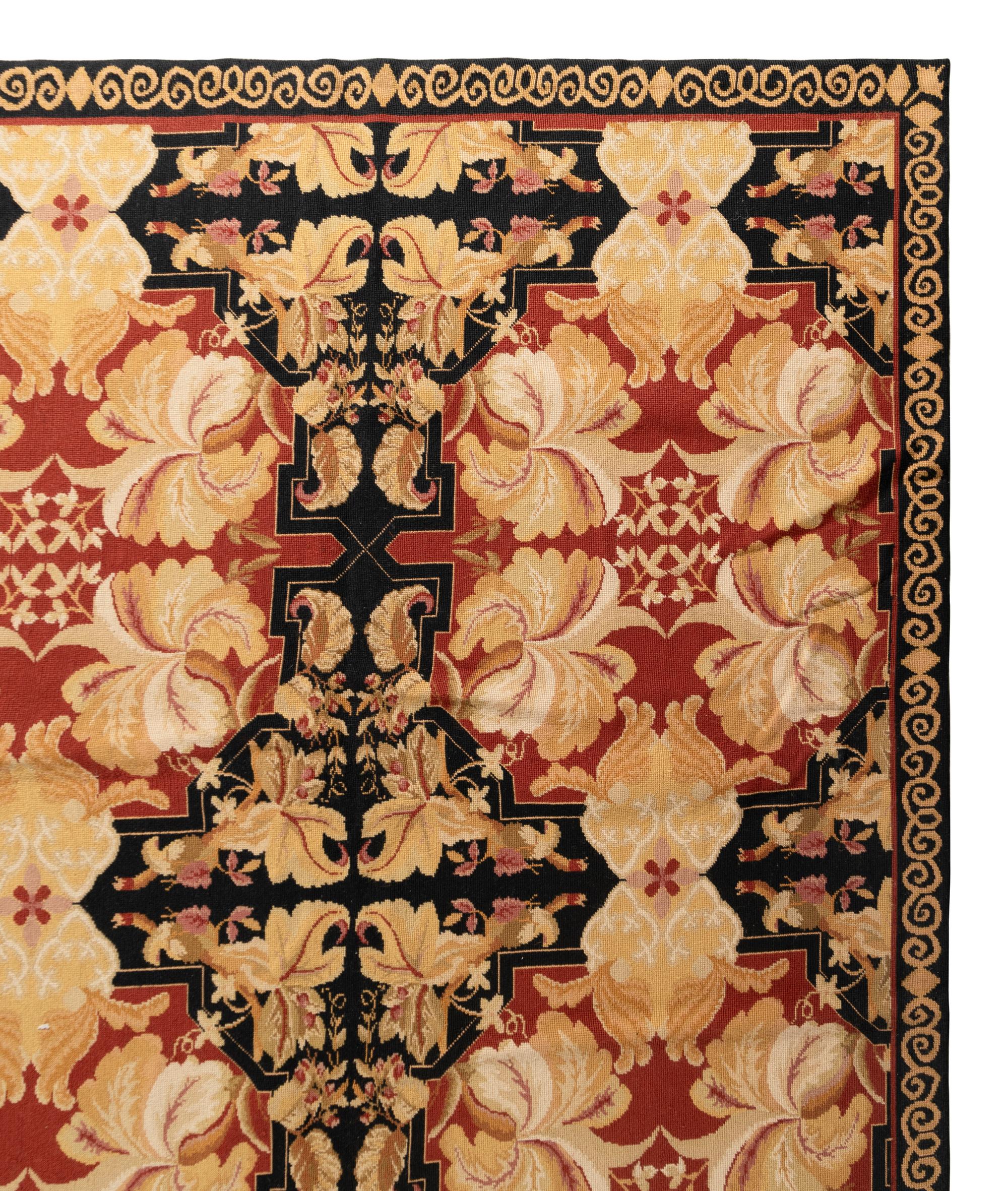 A Large Continental Needlepoint Rug