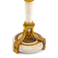 A Pair of Directoire Gilt Bronze and White Marble Candlesticks