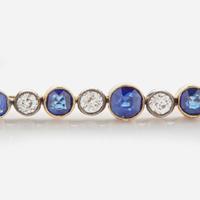 A 14K Yellow Gold, Diamond, and Sapphire Brooch
