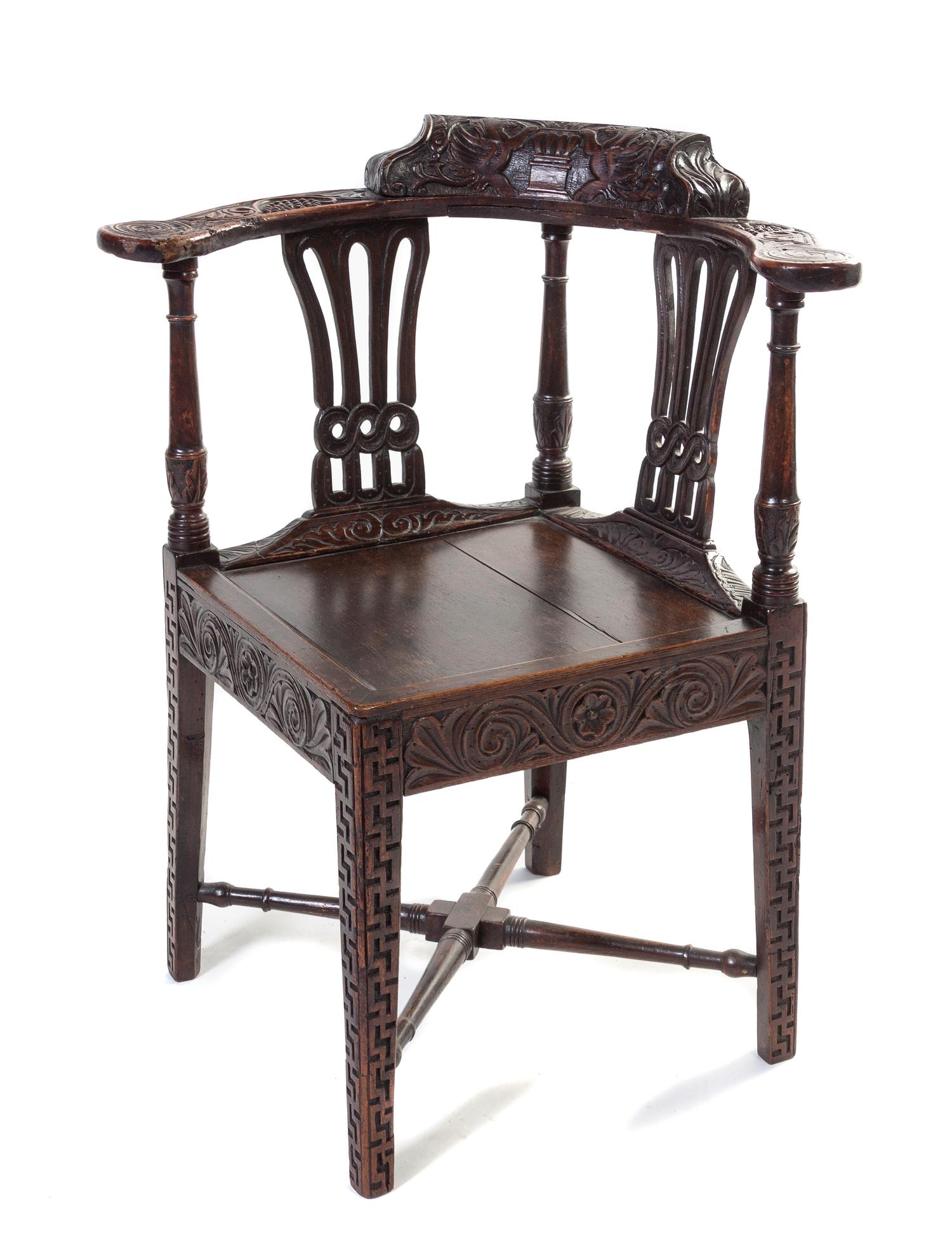 An English Oak Corner Chair, Height 32 1/2 inches.