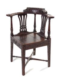 An English Oak Corner Chair, Height 32 1/2 inches.