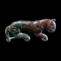 A Eurasian Bronze Pectoral Ornament in the form of a Lion