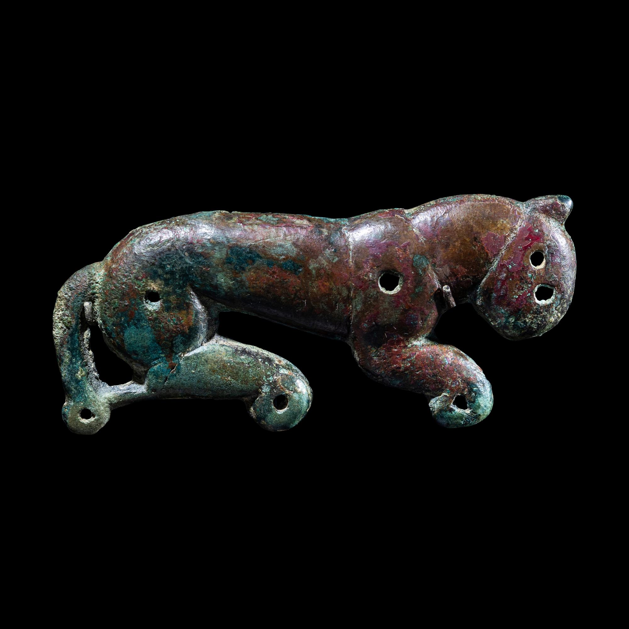 A Eurasian Bronze Pectoral Ornament in the form of a Lion