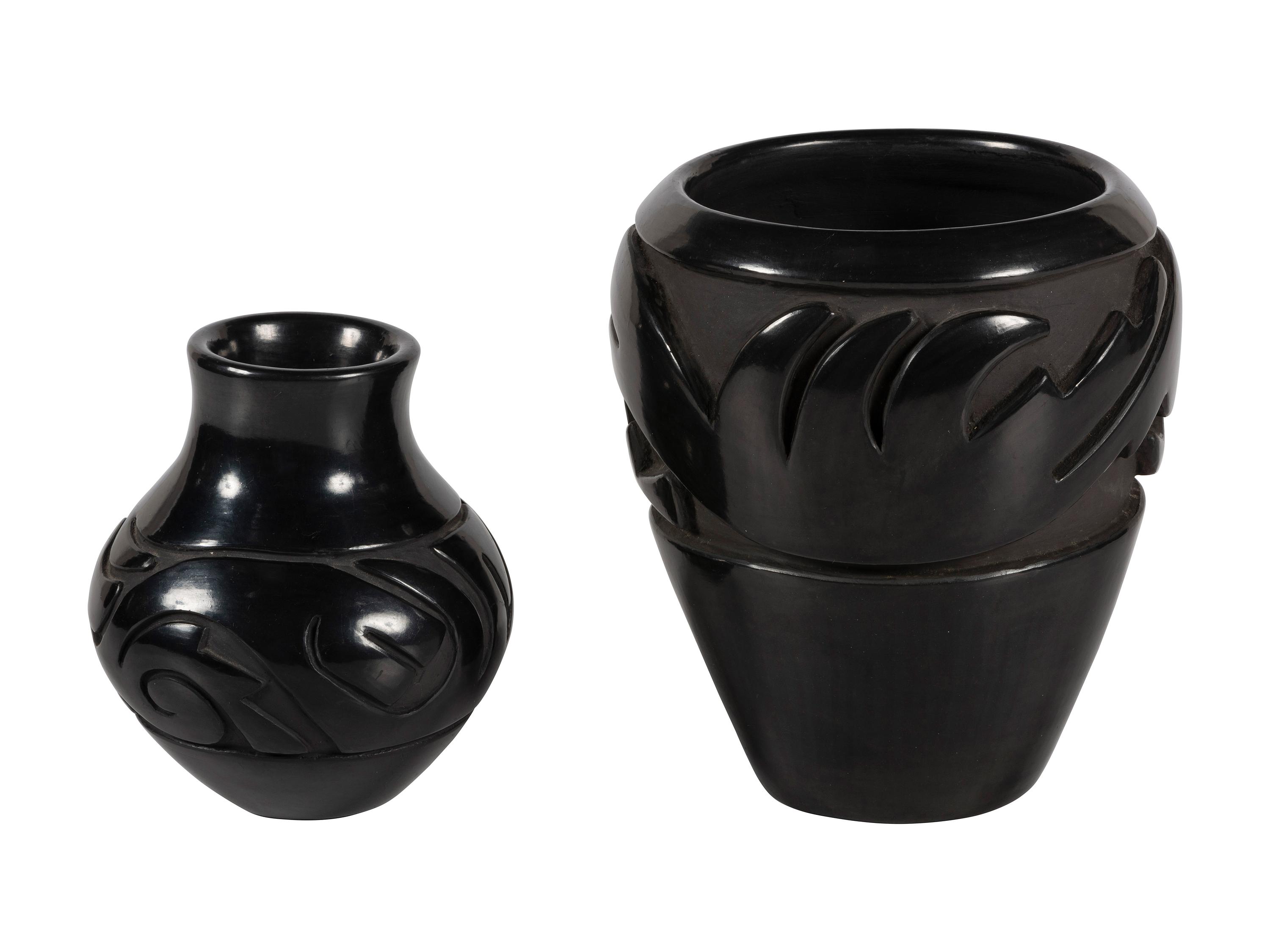 Pair of Carved Blackware Pottery Jars, with Avanyu