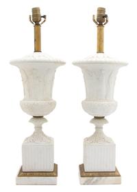 A Pair of French Empire Gilt Metal Mounted Parianware Campana Urns Height 23 1/2 inches.