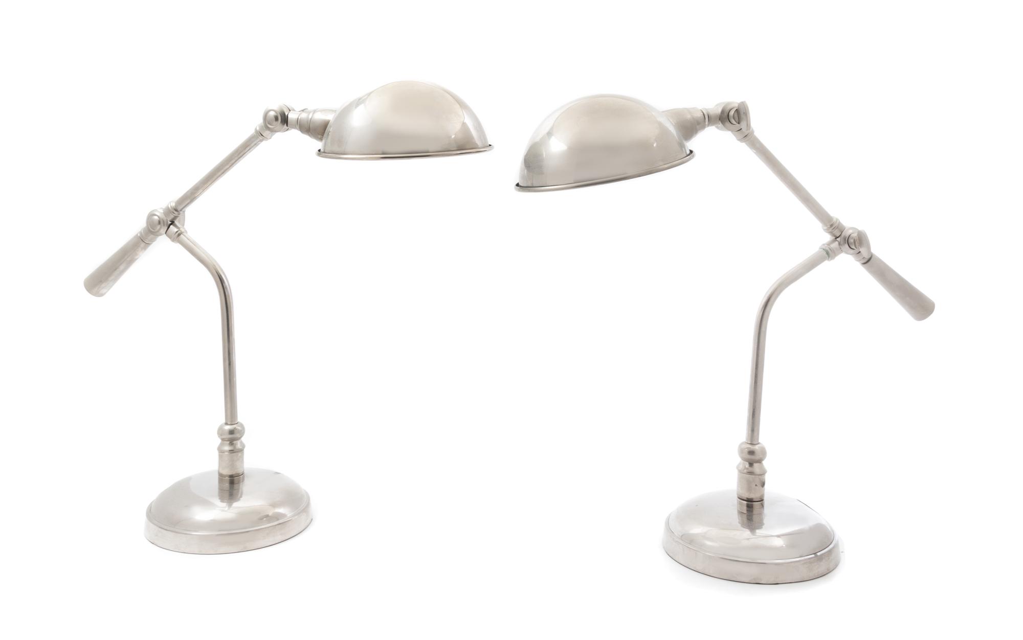 A Pair of Nickel-Plated Counter Balance Desk Lamps Height 17 inches.