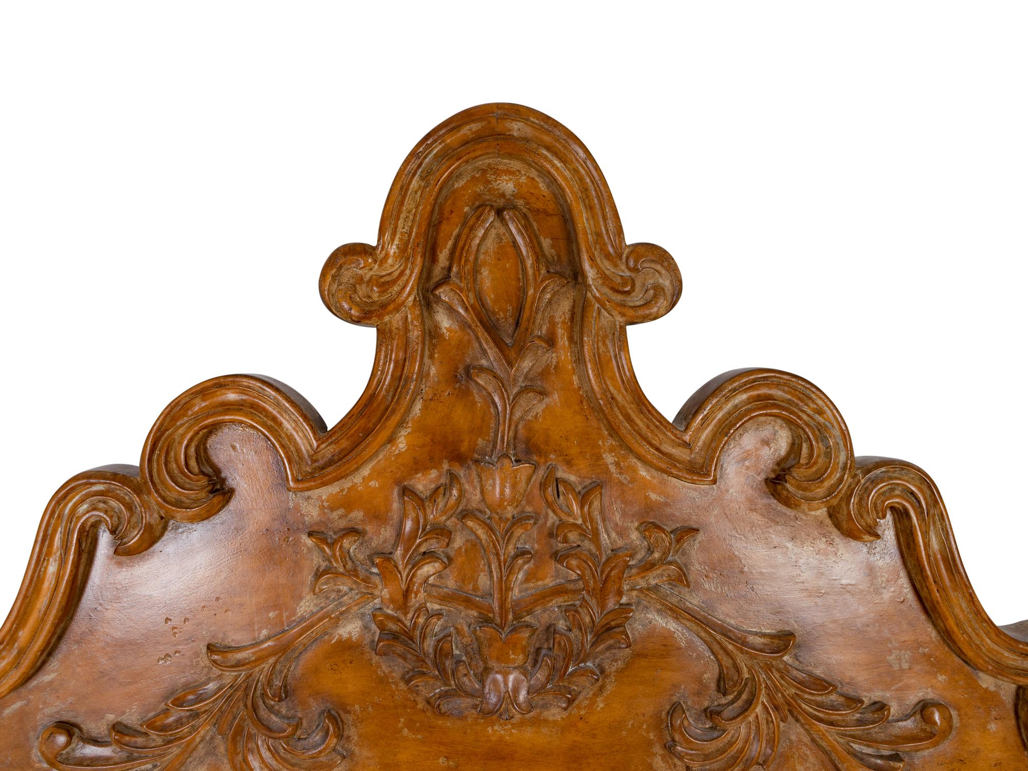 A Spanish Colonial Style Carved Walnut Bed with headboard