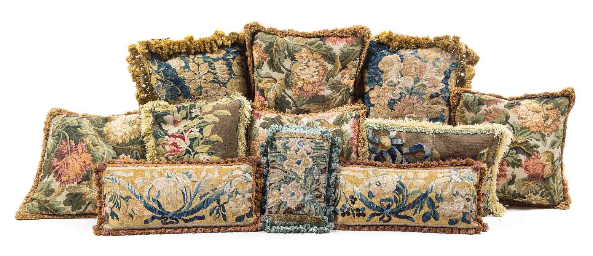 A Collection of Twenty Pillows Width of first 20 inches.