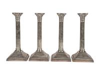 A Set of Four English Silver-Plate Candlesticks