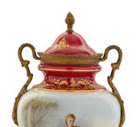 A Gilt Metal Mounted Sèvres Style Porcelain Urn