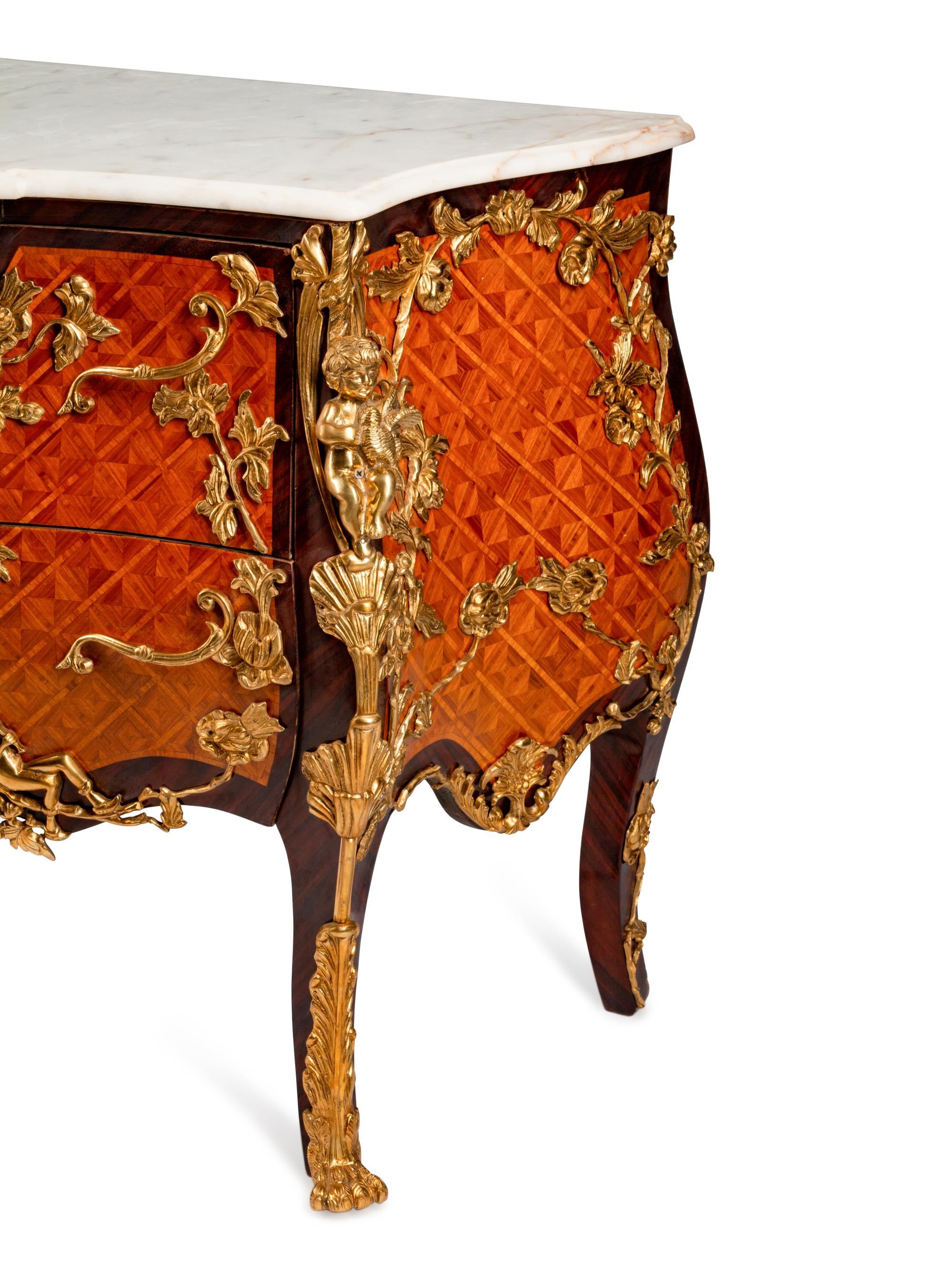 A Louis XV Style Gilt-Bronze-Mounted Parquetry Commode