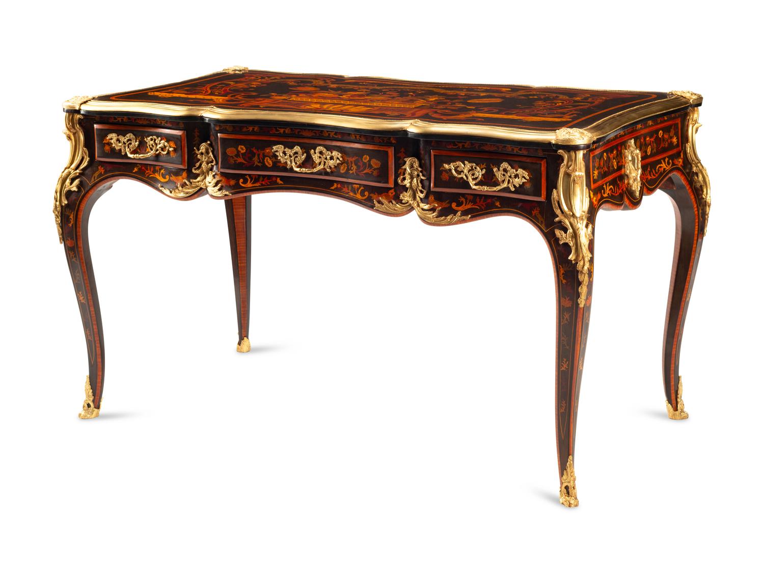 A Louis XV Style Gilt Bronze Mounted Marquetry Bureau Plat