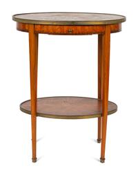 A Louis XVI Two-Tier Marble Inset Top Gilt Metal Mounted Oval Marquetry Side Table — 19TH CENTURY