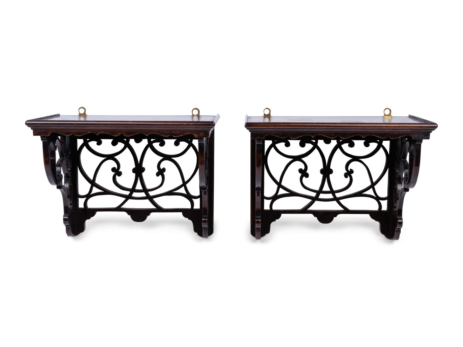 A Pair of English Mahogany Wall Brackets