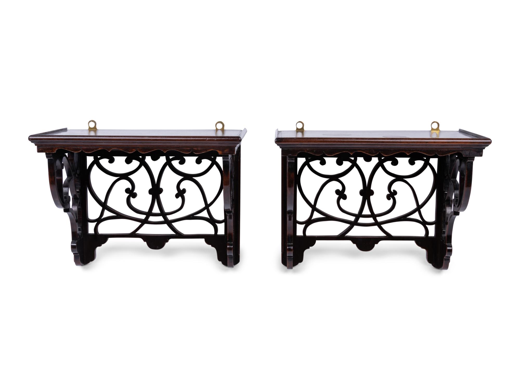 A Pair of English Mahogany Wall Brackets