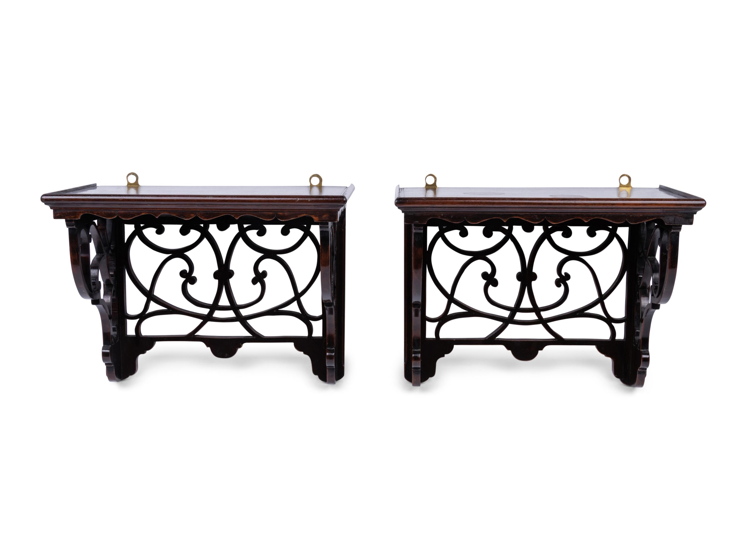 A Pair of English Mahogany Wall Brackets
