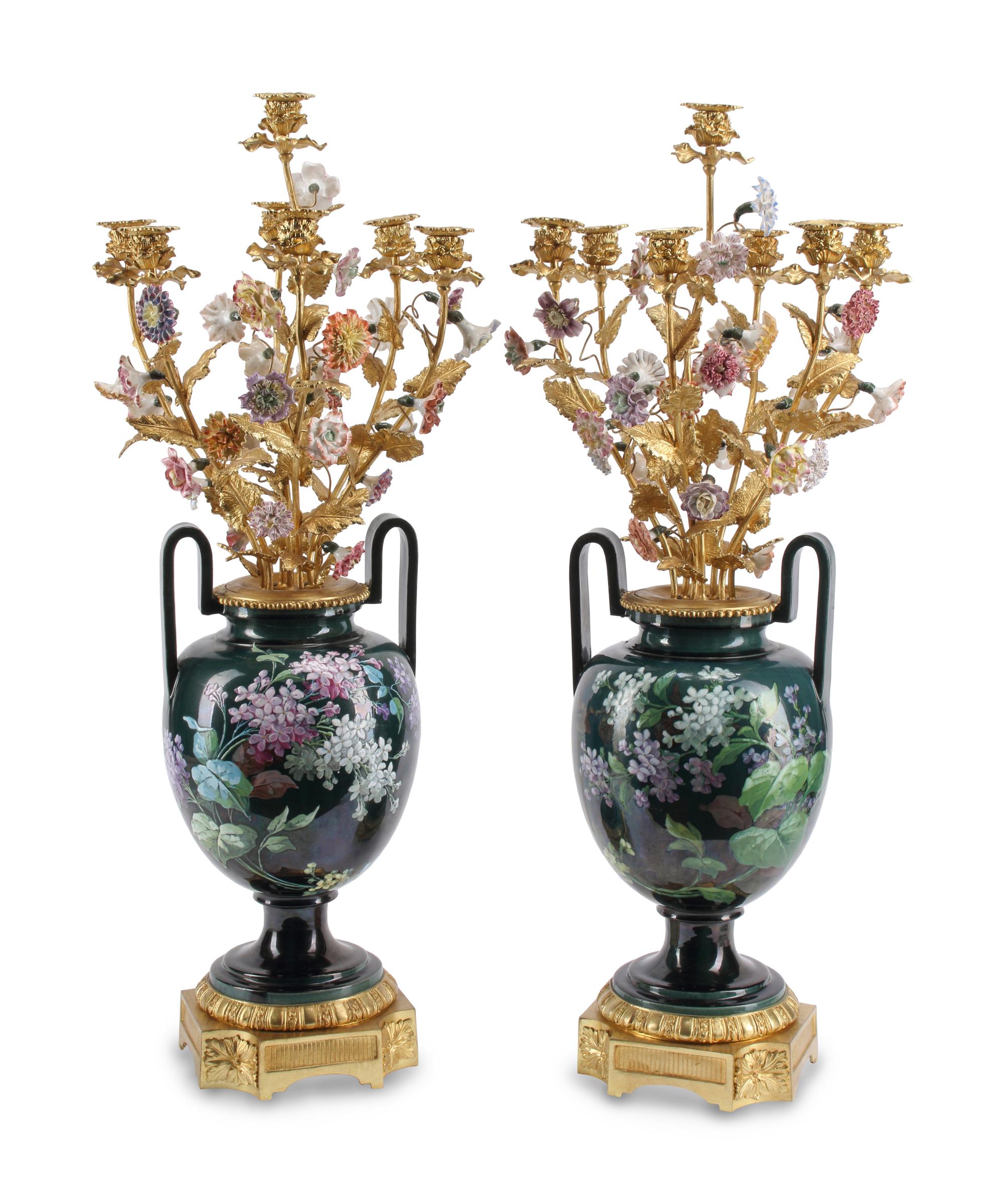A Pair of Large Continental Porcelain and Gilt Bronze Seven-Light Candelabra