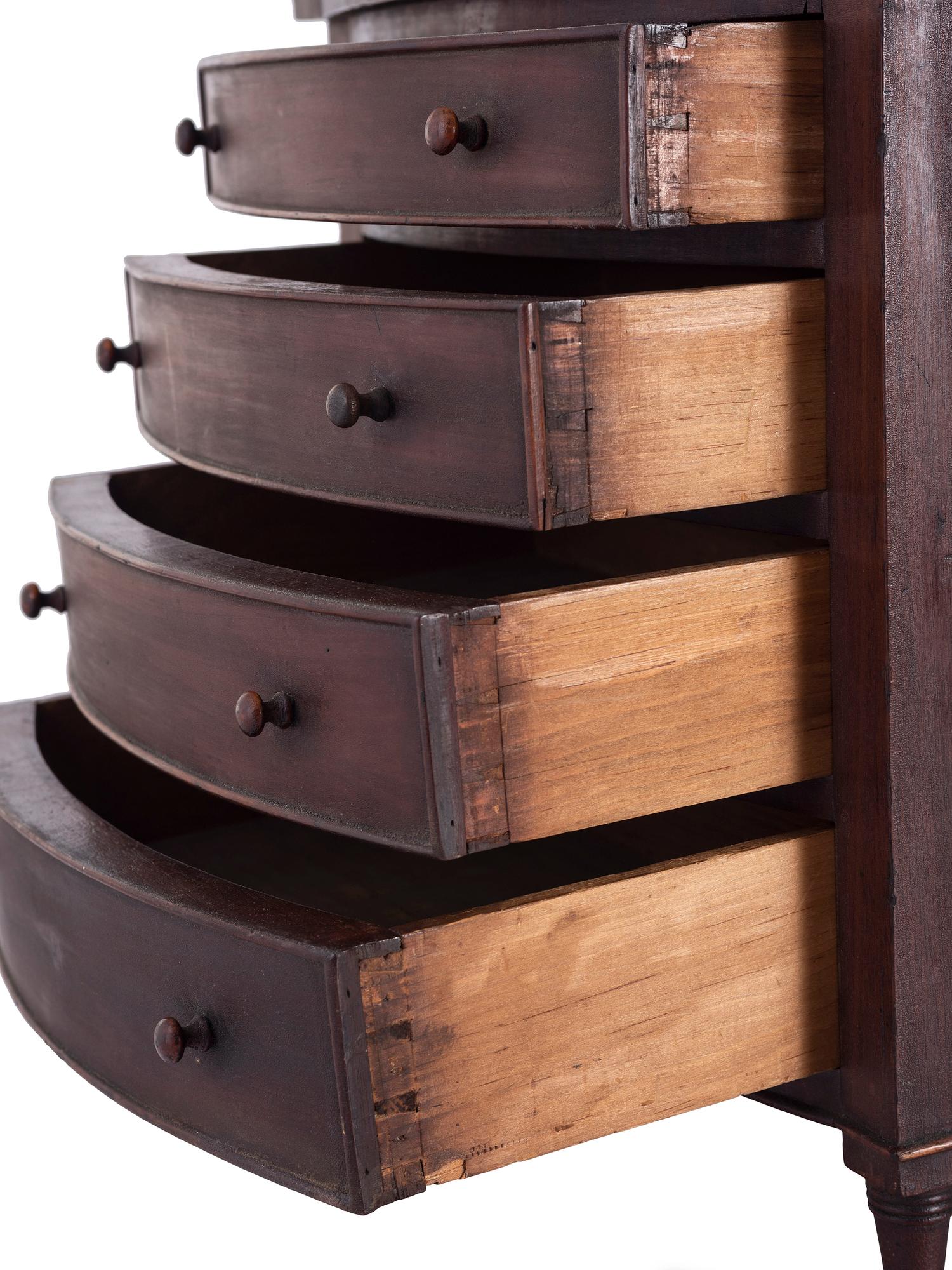 A Federal Stained Mahogany Diminutive Bow-Front Chest of Drawers