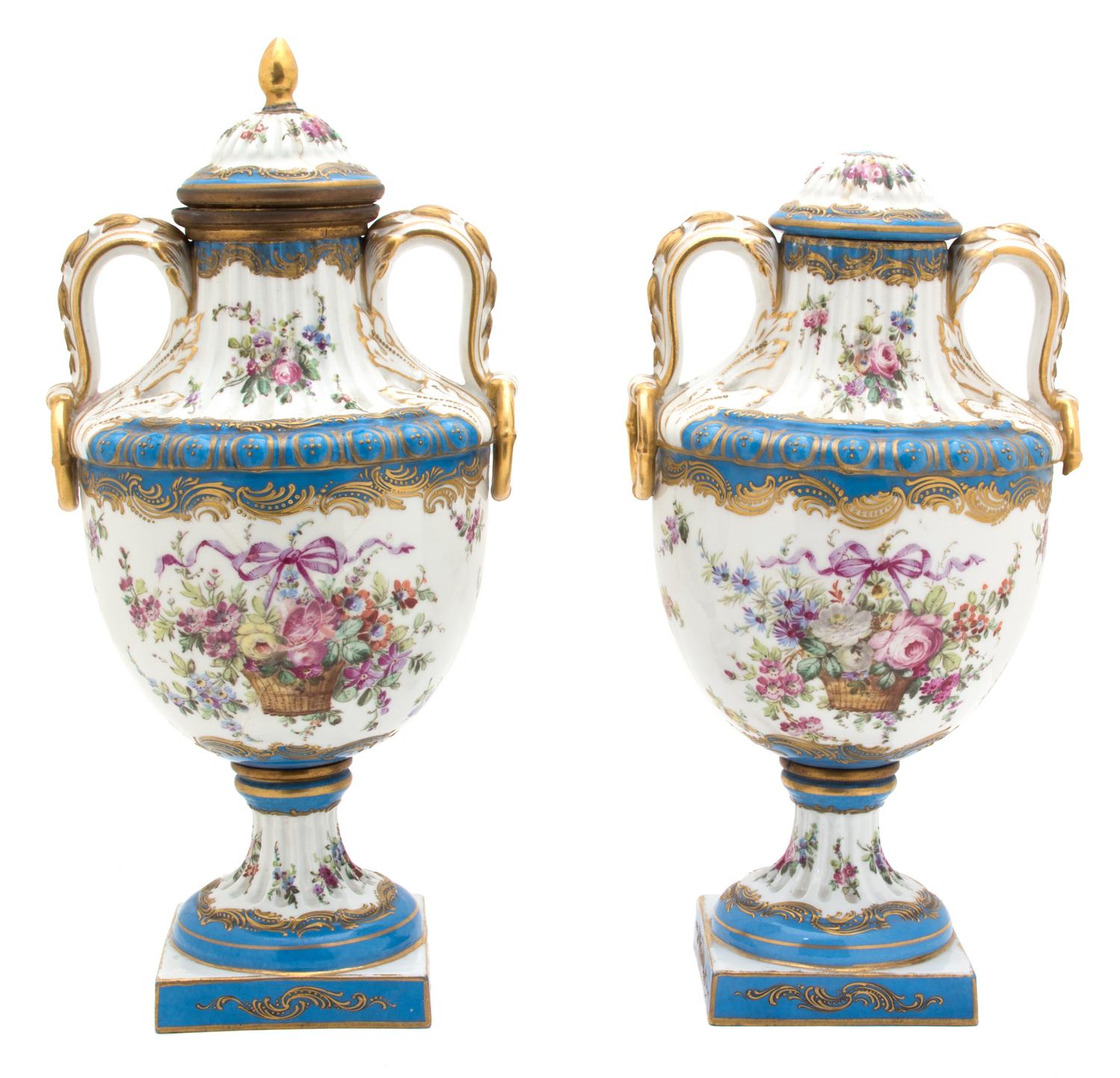 A Pair of French Sevres Gilt Bronze Mounted Lidded Urns Height 15 inches. — 19TH CENTURY