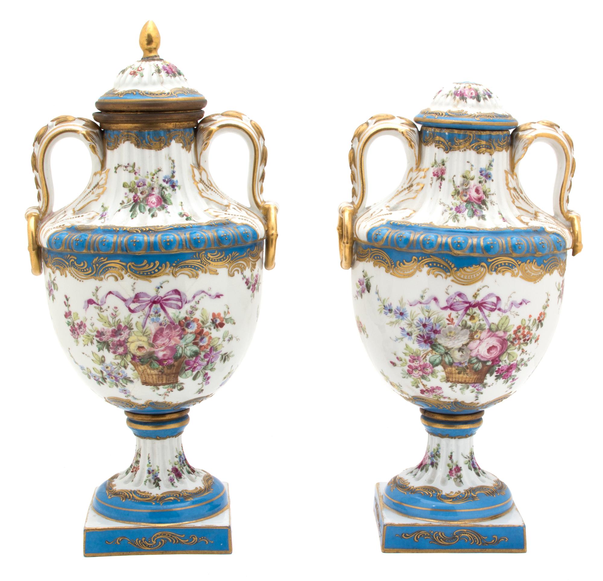 A Pair of French Sevres Gilt Bronze Mounted Lidded Urns Height 15 inches. — 19TH CENTURY
