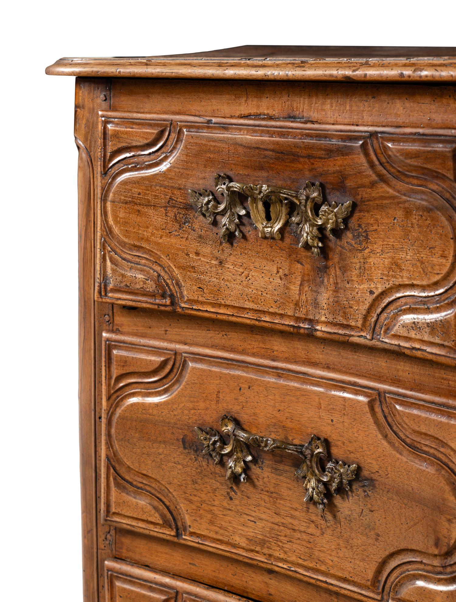 A French Provincial Walnut Serpentine Front Commode