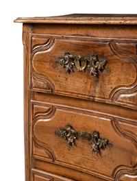 A French Provincial Walnut Serpentine Front Commode