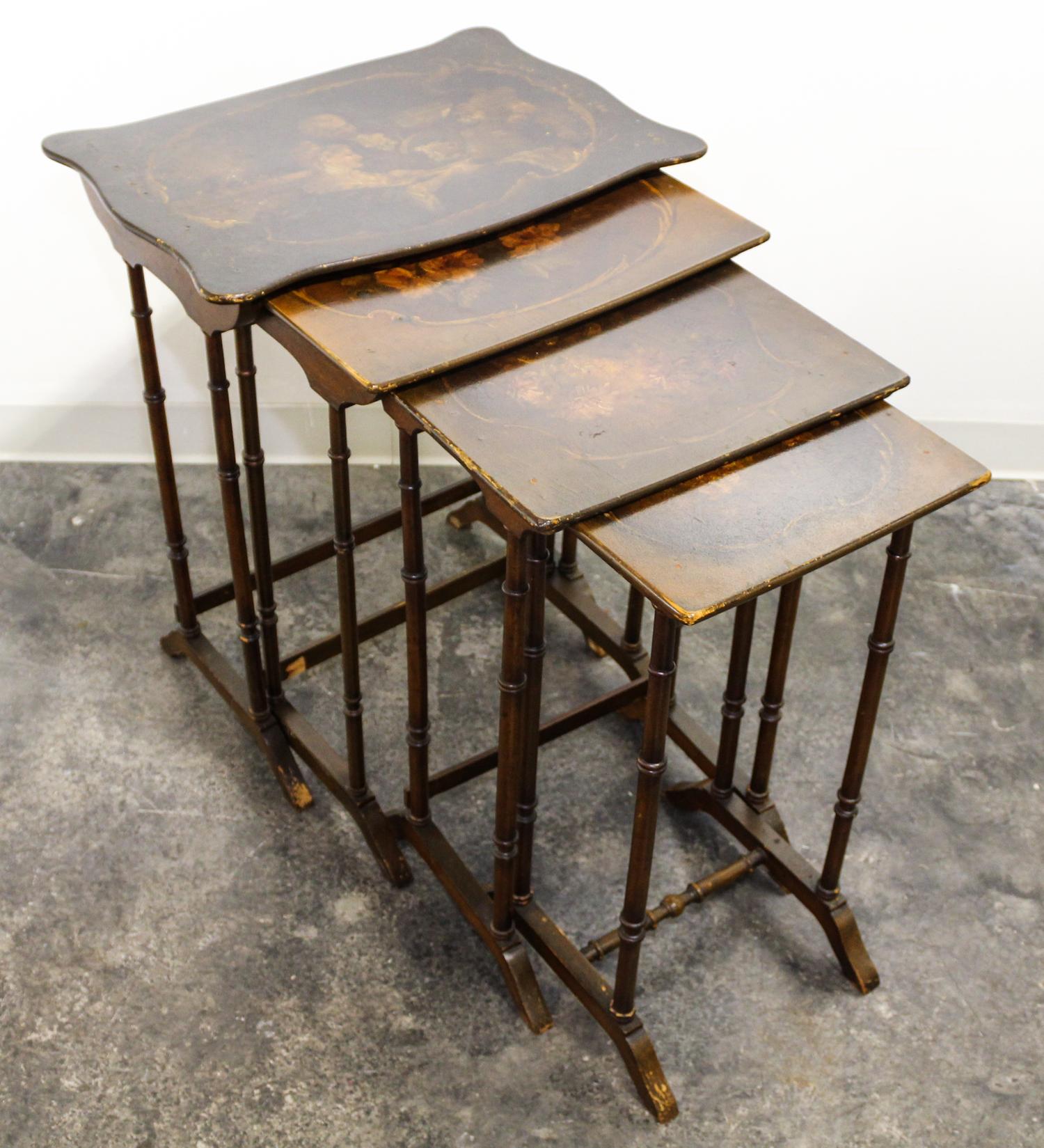 A Set of Four Painted Nesting Tables Height 28 1/2 x width 23 x depth 16 1/4 inches.