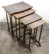 A Set of Four Painted Nesting Tables Height 28 1/2 x width 23 x depth 16 1/4 inches.