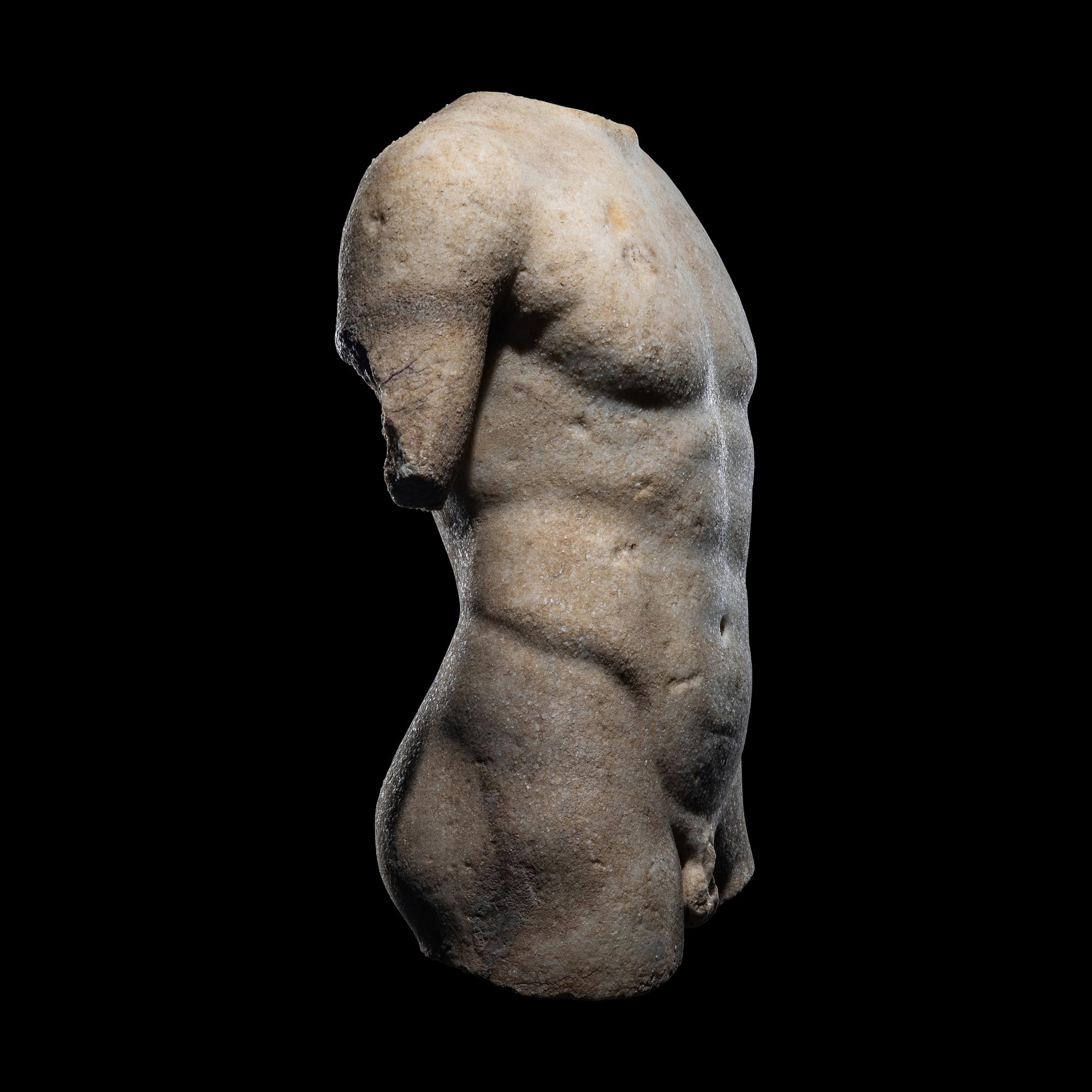 A Roman Marble Torso of a Youthful God or Satyr