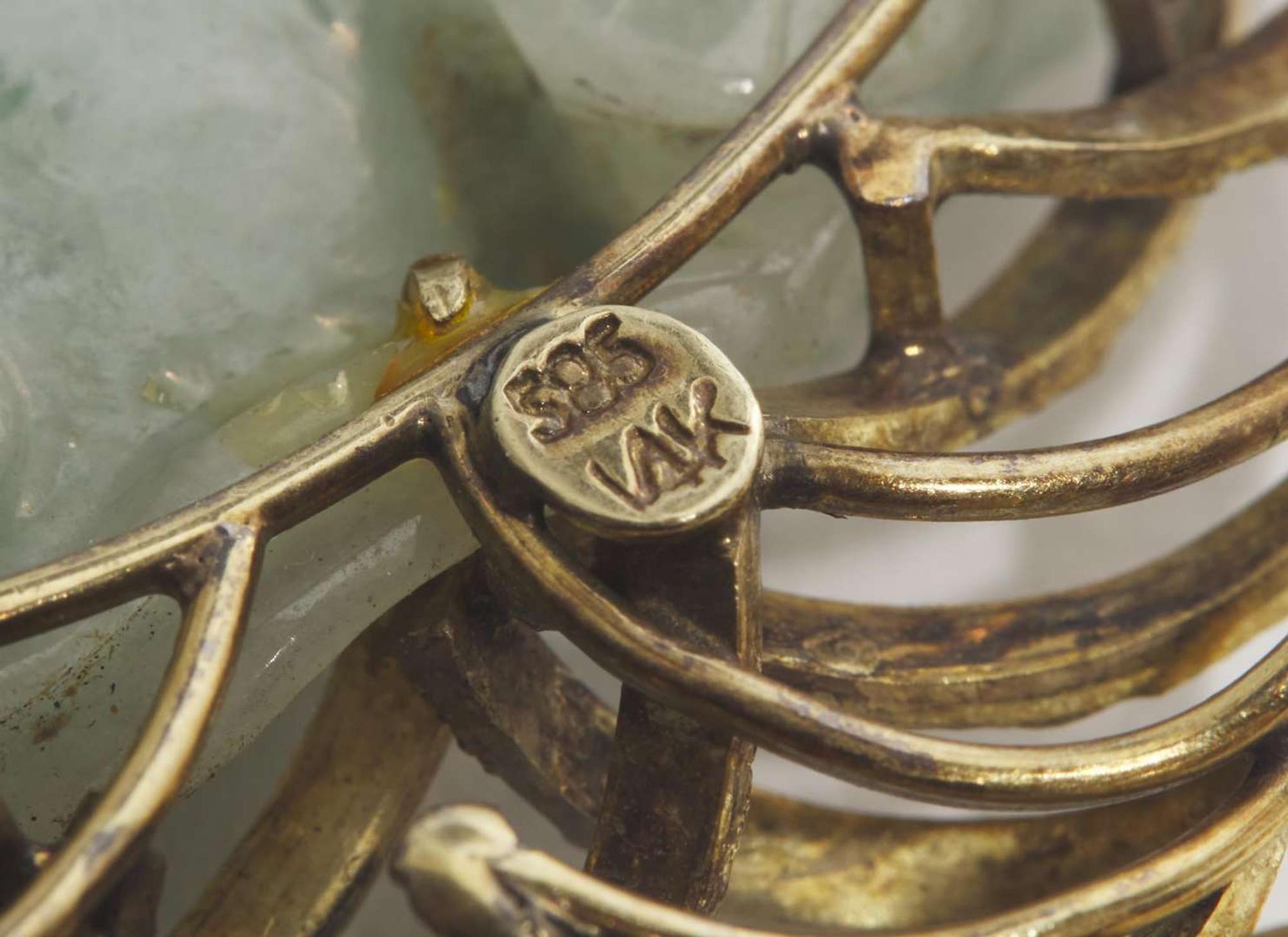 A 14K Yellow Gold and Carved Jade Pendant