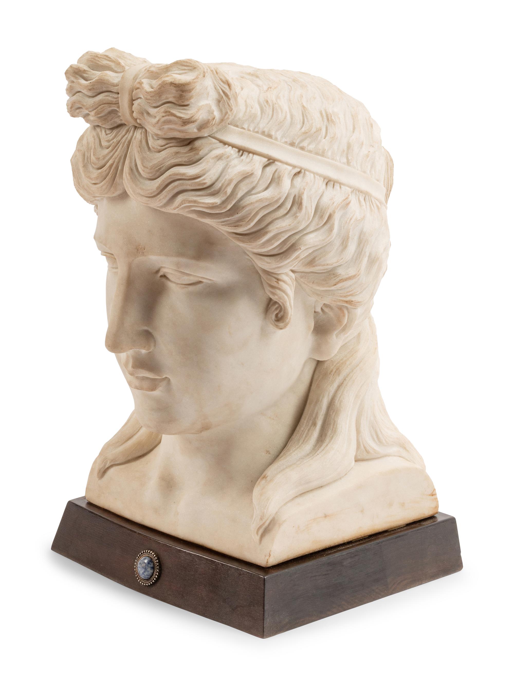 A Composition Marble Head After the Antique