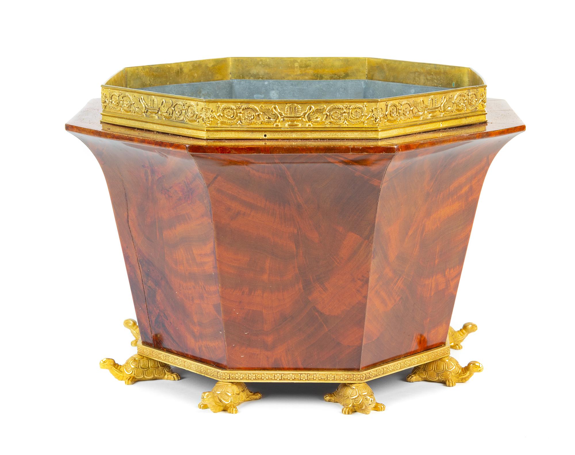 An Empire Style Gilt Bronze Mounted Mahogany Jardiniere Height 13 x width 19 3/4 inches. — 19TH CENTURY