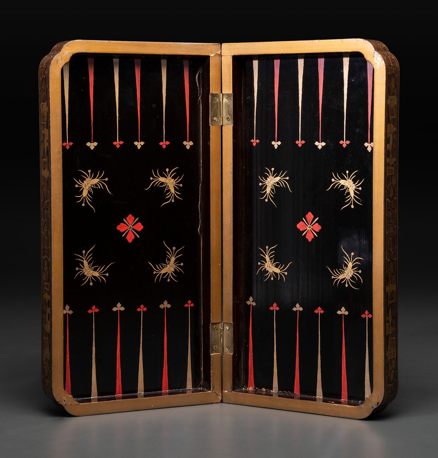 A Chinese Export Gilt Decorated Black Lacquer Folding Game Board