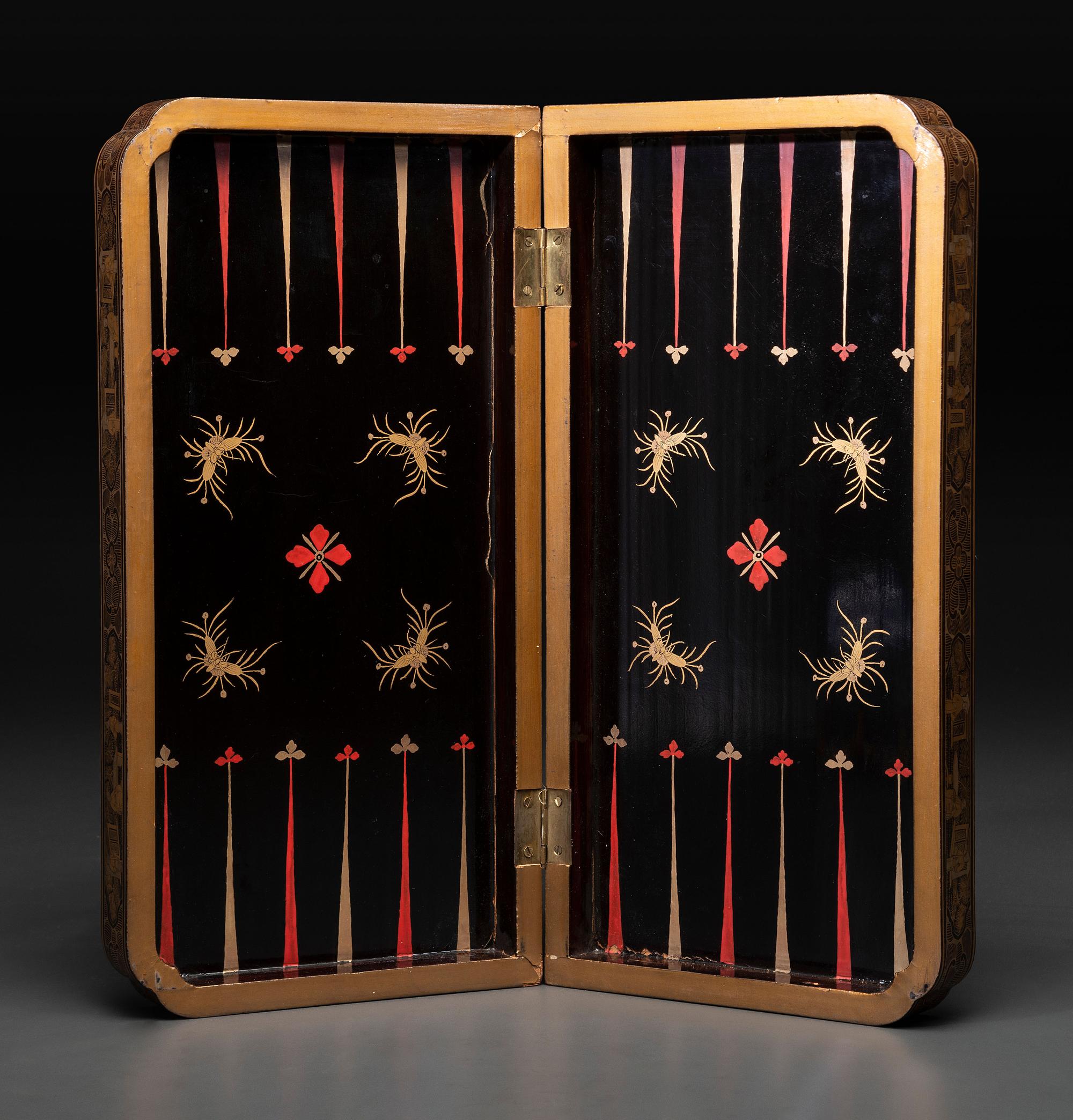 A Chinese Export Gilt Decorated Black Lacquer Folding Game Board