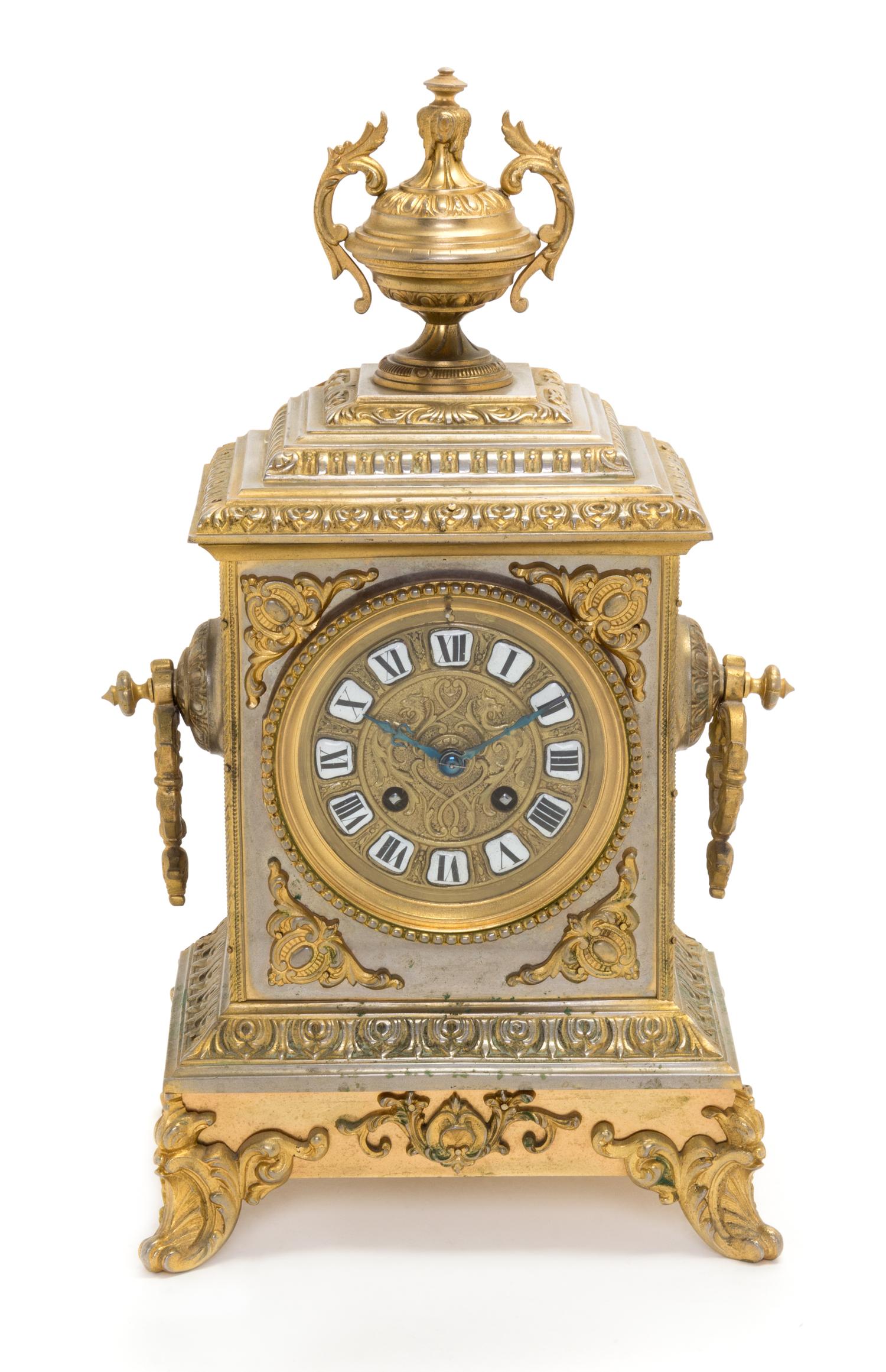 A French Brass Mantel Clock Height 16 inches. — LATE 19TH CENTURY