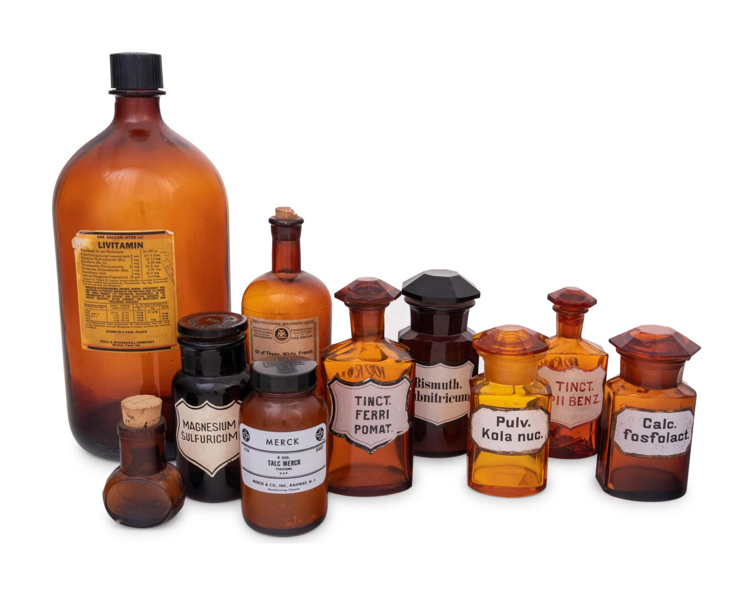 A Collection of Amber Glass Apothecary Jars