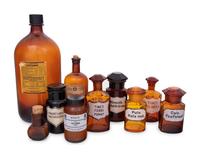 A Collection of Amber Glass Apothecary Jars