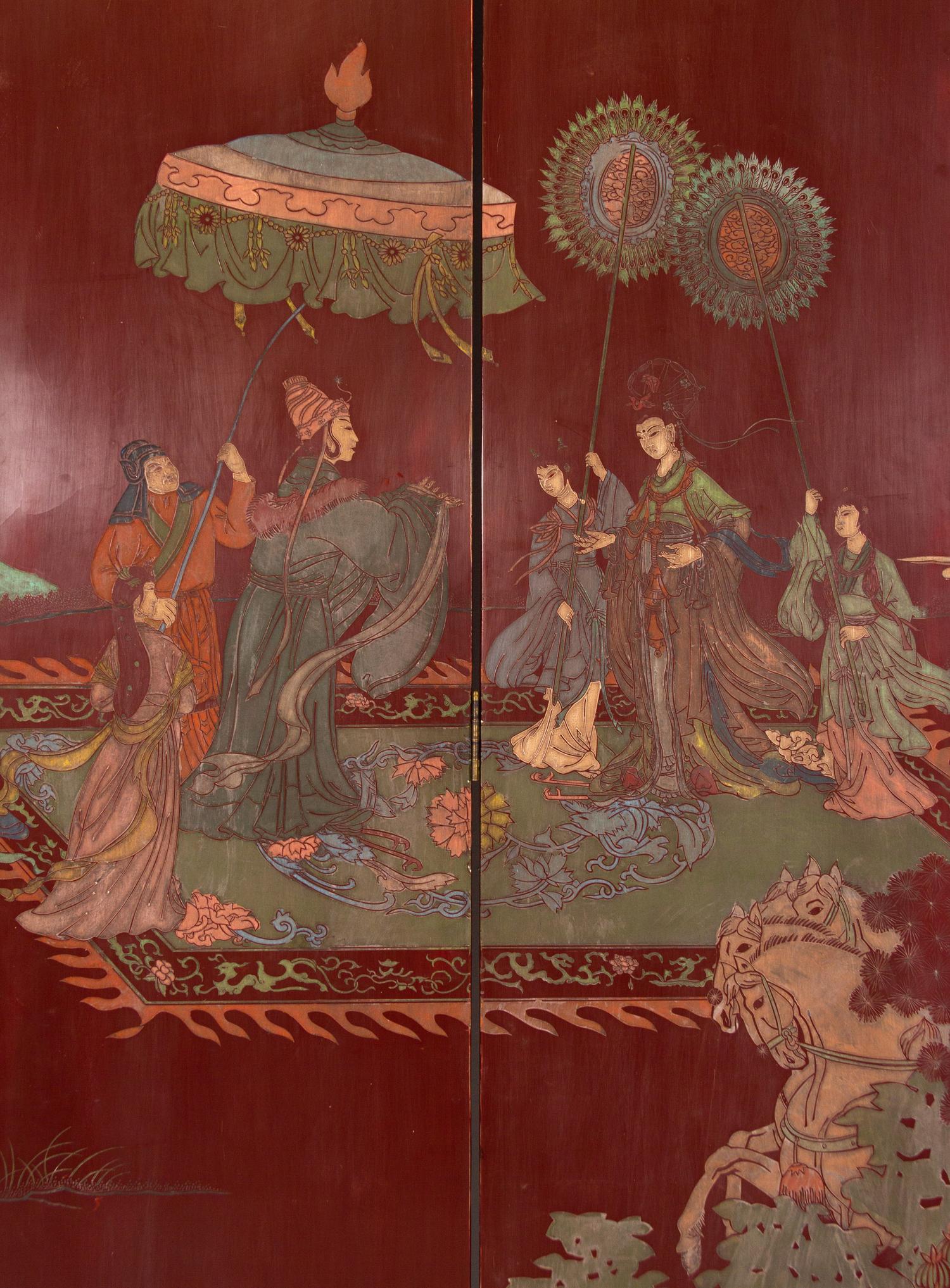 A Twelve-Panel Red Lacquered Coromandel Floor Screen