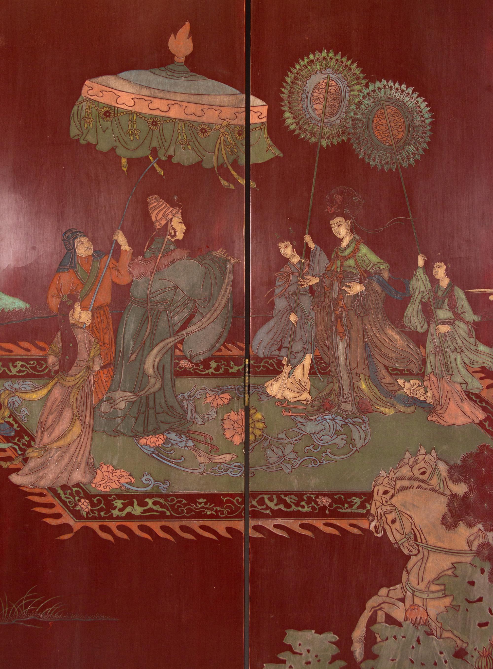 A Twelve-Panel Red Lacquered Coromandel Floor Screen