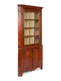 A Chippendale Cherrywood Corner Cupboard